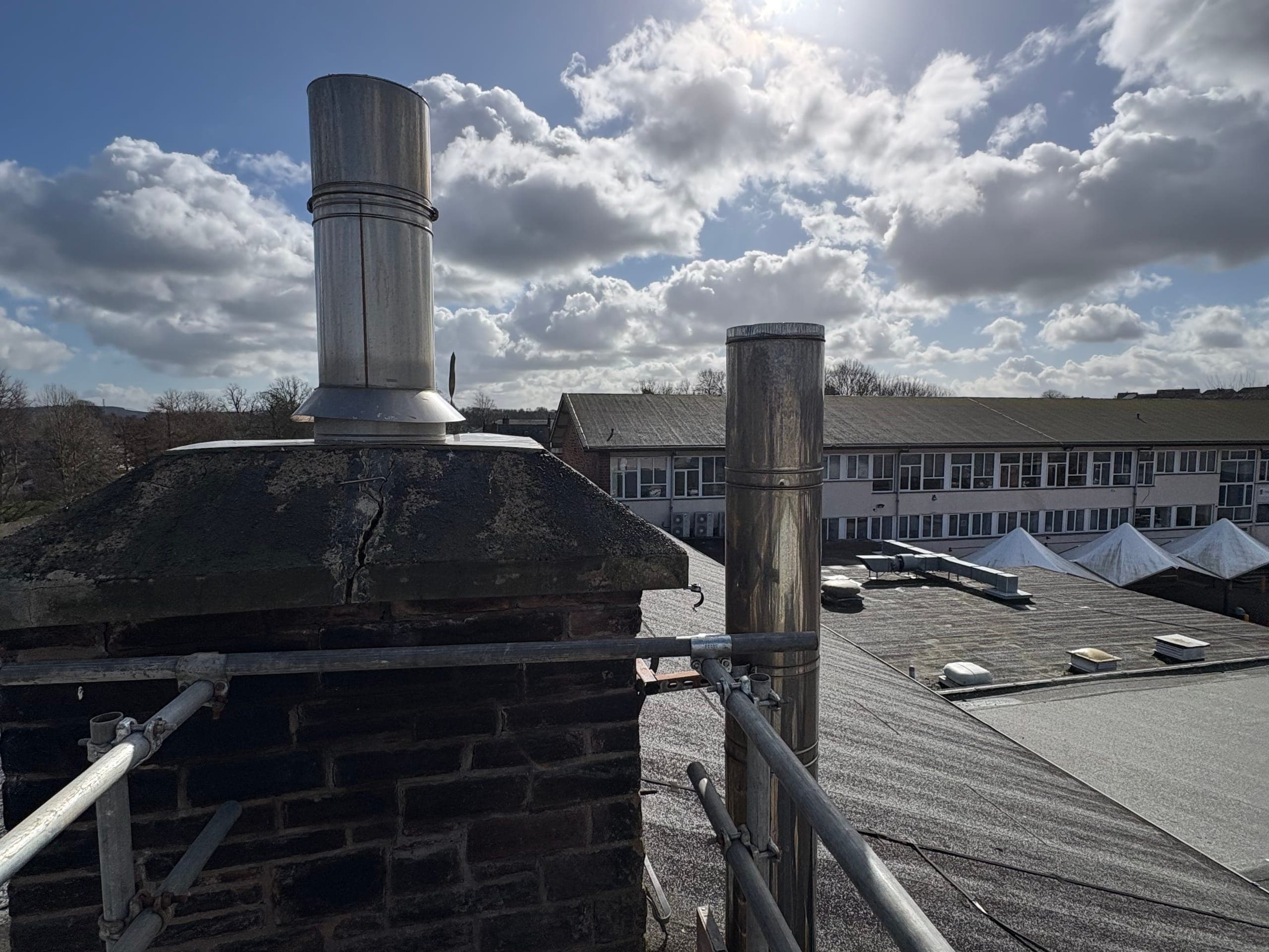 Flue installation on the roof at Ullswater Community College