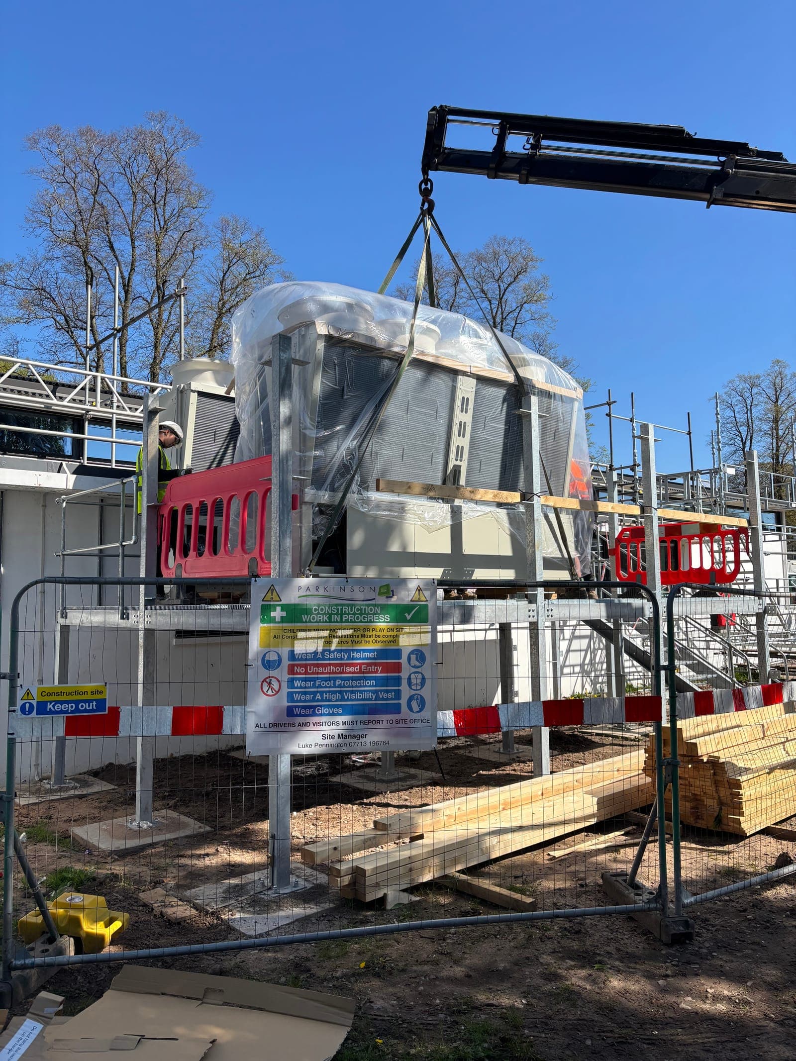 New air handling unit wrapped and staged on site