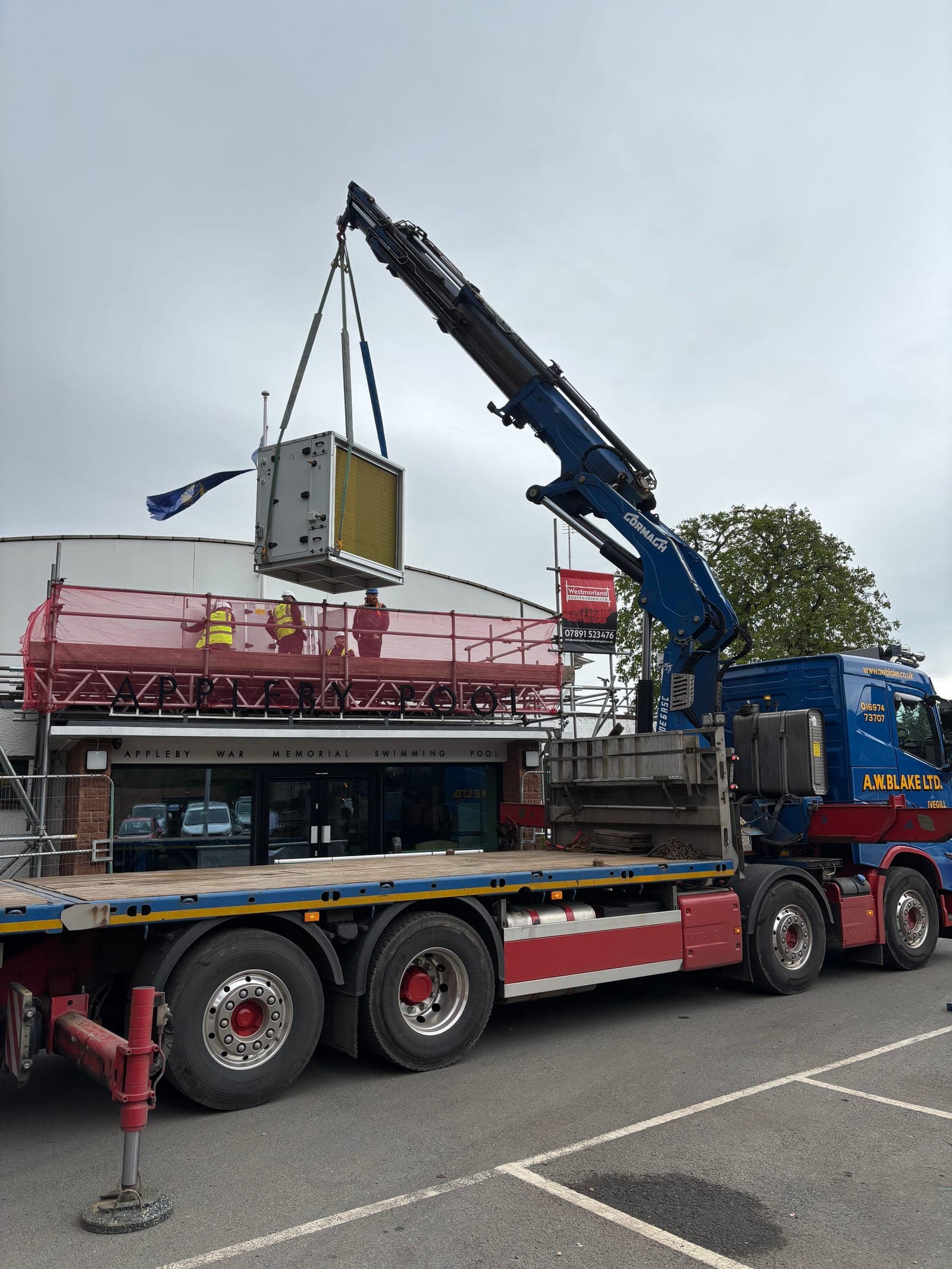 Plant lifted to roof level by crane