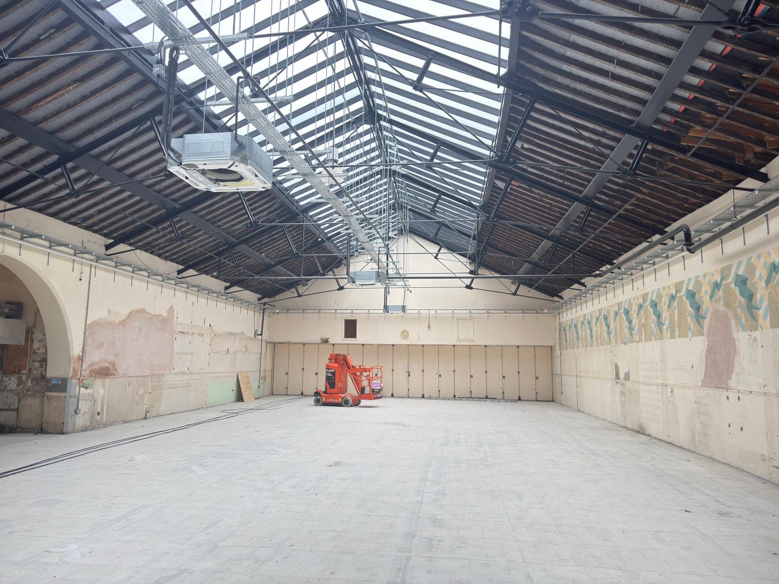 The cleared market hall floor looking the full length of the building