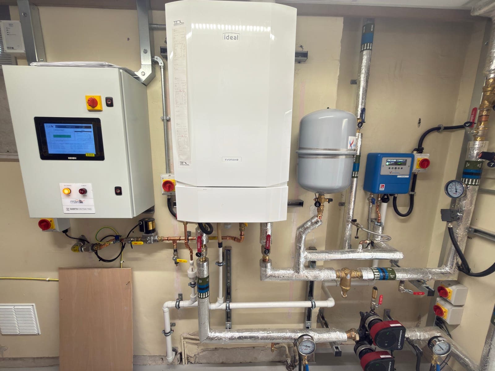 Boiler, control panel and expansion vessel