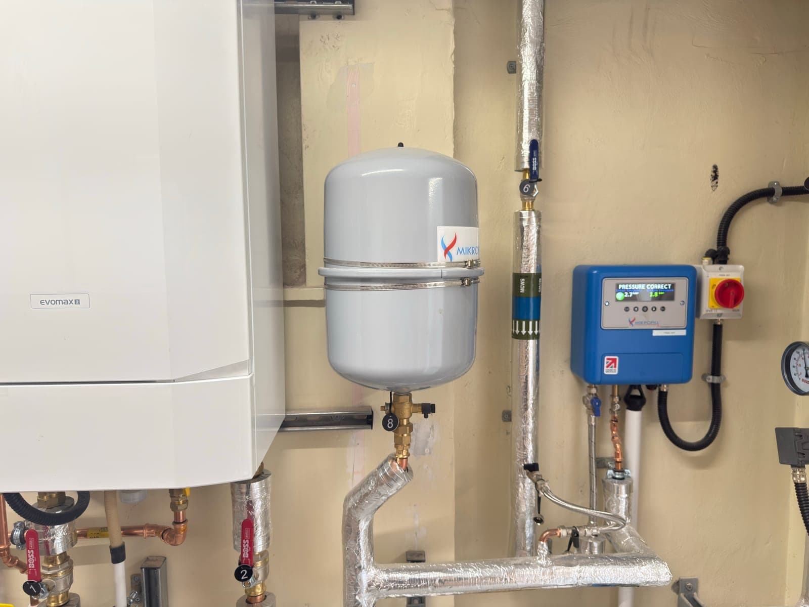 Boiler and expansion vessel with new pipework