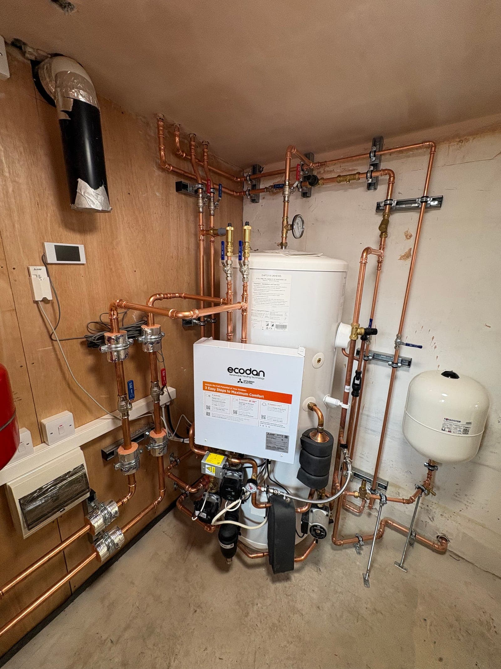 Hot water cylinder, controller and expansion vessels