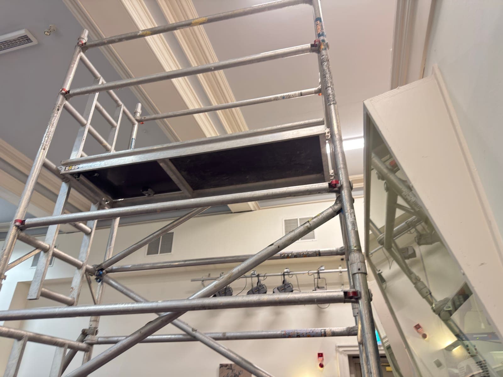 Access tower in the lecture theatre with the ceiling opened up