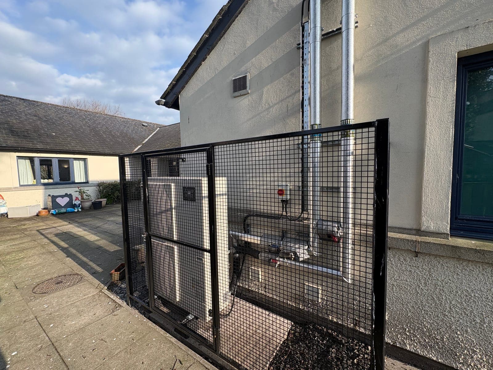 Air source heat pump in its enclosure